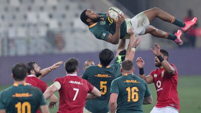 South Africa's Lukhanyo Am collects the ball in a lineout.