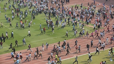Fans throw bottles and chairs, vandalising hoardings at Salt Lake Stadium in Kolkata, India. Following Lionel Messi's brief five-minute appearance, unrest broke out among fans who had paid a significant amount but were unable to see the Argentine football legend. EPA