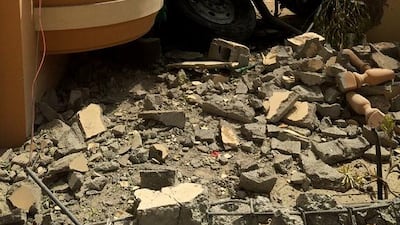 An accident on July 26, 2015 where a 38 year old Asian national suffered injuries after the lorry he was driving swerved and rammed into a house. Courtesy RAK Police