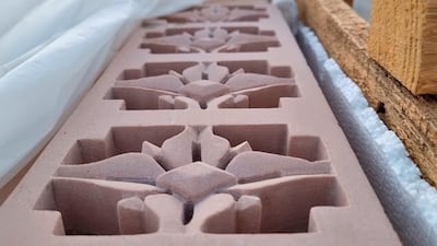 Flower and nature motifs are engraved on many stone slabs.