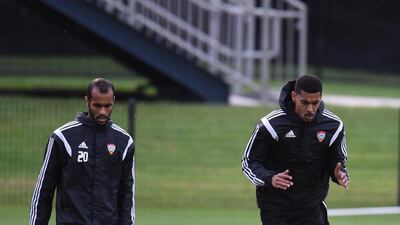 Saeed Al Kathiri, left, and defender Mphammed Fawsi.