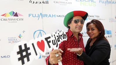 Peter Marco and Aishah Yousef are encouraging the public to use their ILoveFujairah website and Facebook page to post information and help publicise the emirate. Satish Kumar / The National