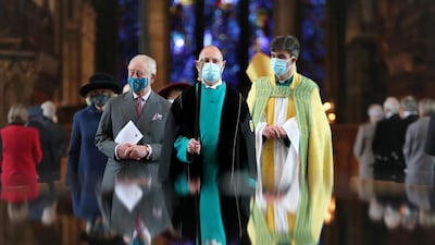 Britain's Charles, Prince of Wales and Camilla, Duchess of Cornwall, and Dean of Salisbury, the Very Reverend Nicholas Papadopulos walk during a visit in celebration of the 800th anniversary of Salisbury Cathedral, in Salisbury, Britain. Reuters
