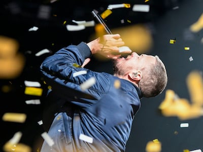 Lead singer, Dan Reynolds from Imagine Dragons will return to Abu Dhabi's Etihad Live in December. Khushnum Bhandari / The National