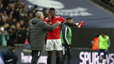 Jose Mourinho, left, has denied he has any problems with Manchester United midfielder Paul Pogba. Catherine Ivill / Getty Images