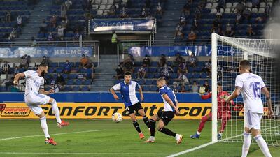 Benzema fires home the third.