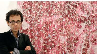 Farhad Moshiri, pictured with his work Love Letter, in Dubai in 2008.