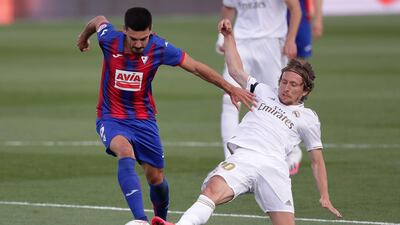 Segio Alvarez of Eibar is challenged by Real's Luka Modric. Getty