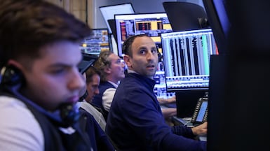 Traders work on the floor at the New York Stock Exchange. Bloomberg