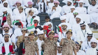 Thousands in the crowd waved UAE and Saudi flags on King Salman’s arrival at the festival. Philip Cheung for the Crown Prince Court - Abu Dhabi