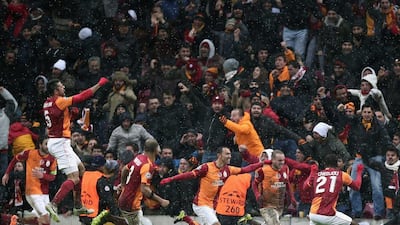Galatasaray 1-0 Juventus. In a match suspended due to heavy snowfall the night before, the Turkish side emerged victorious thanks to Wesley Sneijder's 85th-minute strike. AP Photo