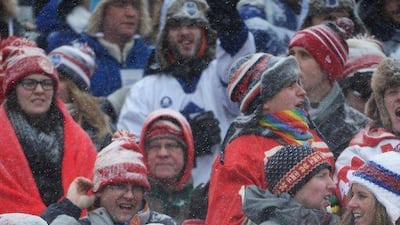 Detroit Red Wings fans cheer as their team takes the ice to play the Toronto Maple Leafs in the NHL Winter Classic on Wednesday at Michigan Stadium in Ann Arbor, Michigan. Jamie Sabau/Getty Images