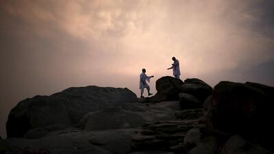 Pilgrims visit Mount Thor in the holy city of Mecca ahead of the annual Haj pilgrimage. Mount Thor marks the start of the journey of the Prophet Mohammed and his companion Abu Bakr Al-Sadeeq from Mecca to Medina. Ahmad Masood / Reuters