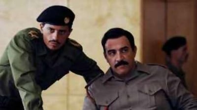 Said Taghmaoui portrays Barzan Ibrahim, left, and Igal Naor portrays Saddam Hussein in a scene from the HBO miniseries, House of Saddam.