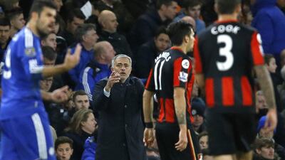 Chelsea manager Jose Mourinho, centre, shouts during the English Premier League match between Chelsea and Bournemouth at Stamford Bridge stadium in London, Saturday, Dec. 5, 2015. (AP Photo/Kirsty Wigglesworth)