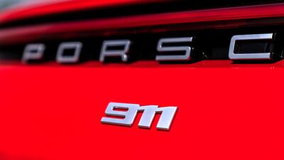 All models include a variable-position rear spoiler as standard, as well as a full-width, seamless light strip topped by two vertical high-mount stoplights designed to mimic those used on its GT racecars. Courtesy Porsche