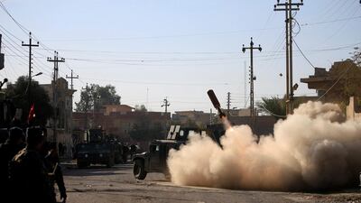 Members of the Iraqi rapid response forces fire a missile toward Islamic State militants during a battle in Somer district of eastern Mosul, Iraq, January 11, 2017. REUTERS/Alaa Al-Marjani