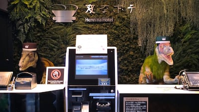 A pair of robot dinosaurs wearing bellboy hats welcome guests from the front desk at the Henn-na Hotel in Urayasu, suburban Tokyo on August. - The reception at the Henn-na Hotel east of Tokyo is eeriely quiet until customers near the robot dinosaurs manning front desk. Their sensors detect motion and they bellow: "Welcome." It might be about the weirdest check-in experience possible, but that's exactly the point at the Henn-na ("Weird") chain, which bills itself as offering the world's first hotels staffed by robots. AFP