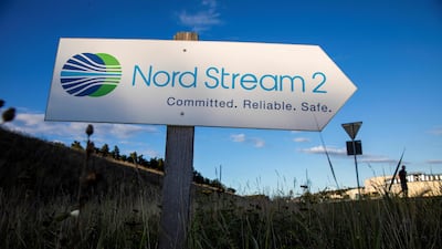 A road sign directing traffic towards the Nord Stream II gas line landfall facility entrance in Lubmin. Germany has suspended certification of the pipeline as part of sanctions against Russia. Photo: AFP