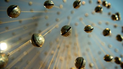 Zadie Xa's Moonlit Confessions Across Deep Sea Echoes includes a chandelier-like piece made of more than 1,000 brass bells. Ahmed Ramzan for The National