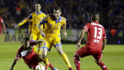 Andre-Pierre Gignac controls the ball for Tigres in a Liga MX match against Tolcua. Daniel Becerril / Reuters / December 3, 2015