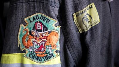 A jacket bearing the crest of the New York Fire Department has also been permanently placed in front of one of the command stations in the ship’s steering station. It was donated to the crew by first responder Lieutenant Bill Butler, who wore it on 9/11 when the south tower collapsed around him