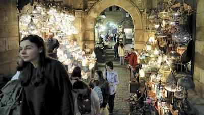 Tourists are seen in a popular tourist area named "Khan el Khalili" in the Al Hussein and Al Azhar districts in old Islamic Cairo. Reuters