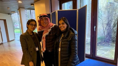 Cambridge University Emirati Society committee members: Dr Mejd Alsari (left) and Mira Al Hussein with Hugh Nicklin, chairman of the Trucial Oman Scouts Association