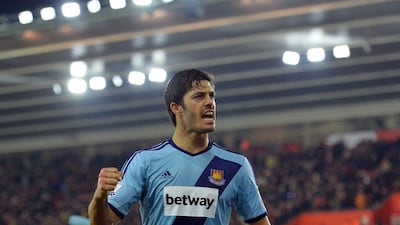 West Ham United's James Tomkins celebrates at the final whistle of his side's 0-0 draw away with Southampton on Wednesday night in the Premier League. Glyn Kirk / AFP