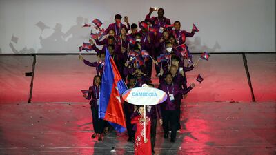 The Cambodian delegation enters the stage during the 31st Southeast Asian Games opening ceremony. AP