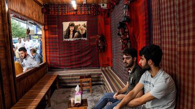 Men sit at a traditional cafe in the historic city of Shaqlawah, about 48 kilometres northeast of Erbil, in the northern Iraqi Kurdish autonomous region. AFP