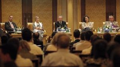 Curators gather at the roundtable in Emirates Palace.