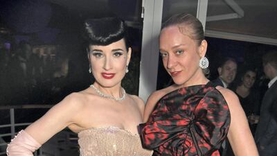 Dita Von Teese and Chloe Sevigny attend the Vanity Fair and Chopard Party celebrating the 72nd Annual Cannes Film Festival at Hotel du Cap-Eden-Roc on May 18, 2019 in Cap d'Antibes, France. Getty Images
