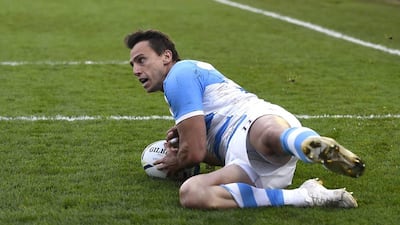 Argentina's Juan Imhoff slides in for a try in his team's Rugby World Cup pool play win over Georgia on Friday night. Dylan Martinez / Reuters / September 25, 2015