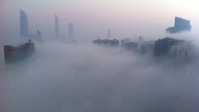 Fog covers Abu Dhabi's Corniche as the misty conditions return. Scott Armstrong
