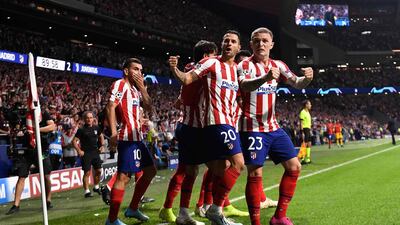 Atletico Madrid's Hector Herrera celebrates scoring their second goal to make it 2-2, the final result. AFP
