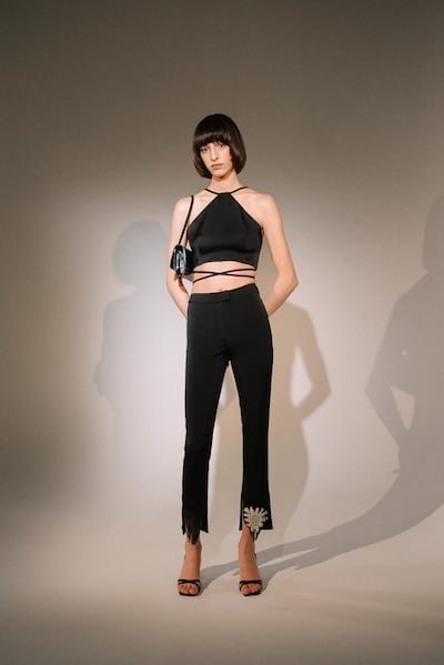 Tassel trousers, complete with a daisy, by Nafsika Skourti