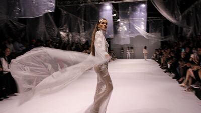 A model spins on the catwalk. EPA