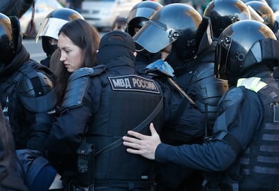Police detain a person taking part in a protest in St Petersburg. EPA