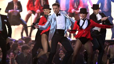 Hugh Jackman kicked off the show with a song from The Greatest Showman. Gareth Cattermole/Getty Images
