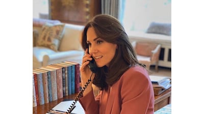 The Duchess of Cambridge wears a pink Marks & Spencer suit to work from home at Kensington Palace on March 30. She later re-wore the trousers for a Park Parenting Meet-up in September. Kensington Palace / Instagram