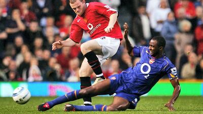 Wayne Rooney of Manchester United battles with Patrick Vieira of Arsenal during a Premier League match in 2004. United won the game to end a 49 game Arsenal winning streak. Getty Images