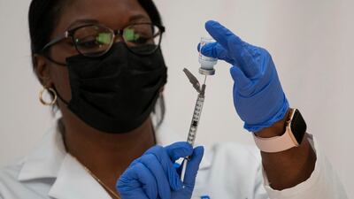 Michelle Chester, director of employee health services at Northwell Health, prepares the Moderna Covid-19 vaccine at Northwell Health's Long Island Jewish Valley Stream hospital in Valley Stream, New York, on Monday, December 21, 2020. AP