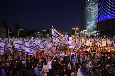 Protesters take part in a rally against the Israeli government's justice system reform plans in Tel Aviv in July 2023. EPA