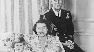 Princess Elizabeth and Prince Philip sit with daughter Princess Anne and son Prince Charles in 1950. Central Press/Hulton Archive/Getty Images
