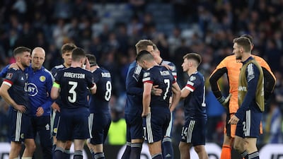 Scotland players at the end of the game. AP