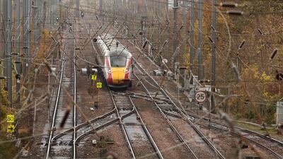 The LNER Azuma train, on which a mass stabbing took place, is driven away from Huntingdon Station in Huntingdon, eastern England. AFP