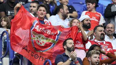 Supporters of Arsenal during the match against Al Nasr held at the Al Maktoum stadium in Dubai. Pawan Singh / The National