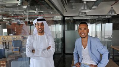 Bernard Lee (r) anad Fahad Al Ahbabi are the co-founders of the GlassQubethat provides hundreds of workstations for start-ups at Sky Tower on Reem Island in Abu Dhabi. Delores Johnson / The National