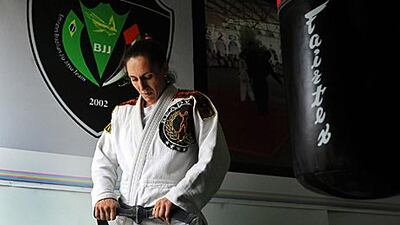 Caroline de Lazzer is a jiu-jitsu competitor who works and trains in Abu Dhabi and is married to Marcos 'Santa Cruz' Oliveira, a Brazilian champion.